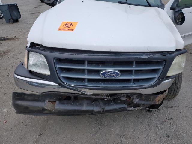 Photo 11 from auction – 2002 FORD F150 with VIN 1FTRX17L82KB10097