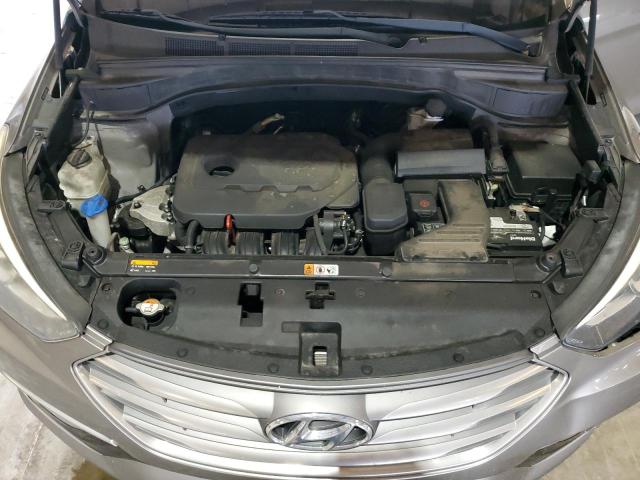 Photo 12 from auction – 2017 HYUNDAI SANTA FE S with VIN 5NMZU3LBXHH047882