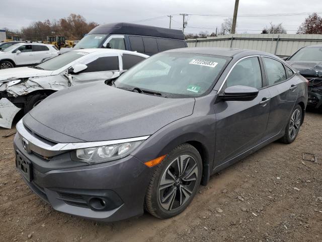 HONDA CIVIC EX 2016 with VIN 2HGFC1F32GH656152 - Photo from auction