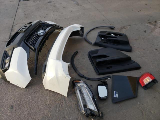 Photo 13 from auction – 2021 HONDA PASSPORT E with VIN 5FNYF8H06MB007613