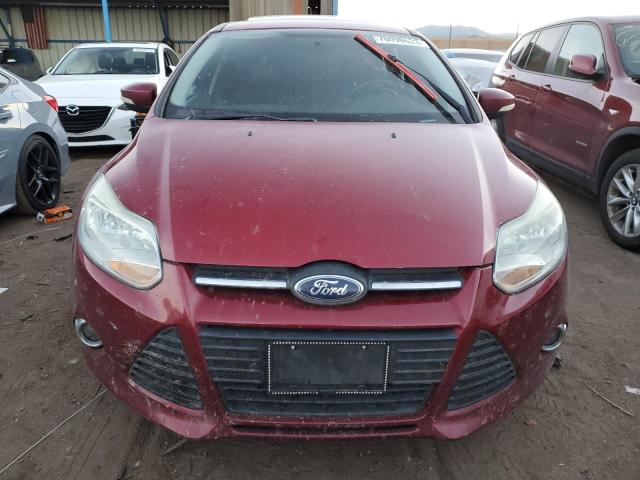 Foto 5 de la subasta – 2014 FORD FOCUS SE con VIN 1FADP3K29EL373756