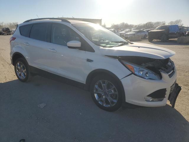 Photo 4 from auction – 2014 FORD ESCAPE SE with VIN 1FMCU9G92EUA93173