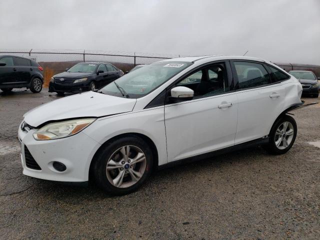 FORD FOCUS 2014 with VIN 1FADP3F26EL403032 - Photo from auction