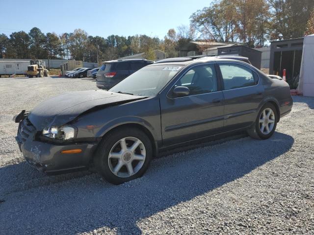 NISSAN MAXIMA GLE 2000 with VIN JN1CA31D4YT550523 - Photo from auction