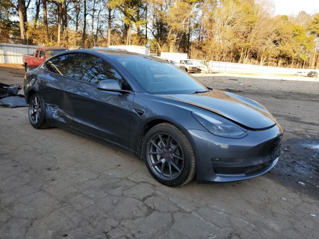 Photo 4 from auction – 2021 TESLA MODEL 3 with VIN 5YJ3E1EA9MF976744