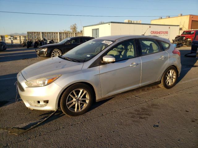 FORD FOCUS SE 2015 with VIN 1FADP3K24FL385413 - Photo from auction