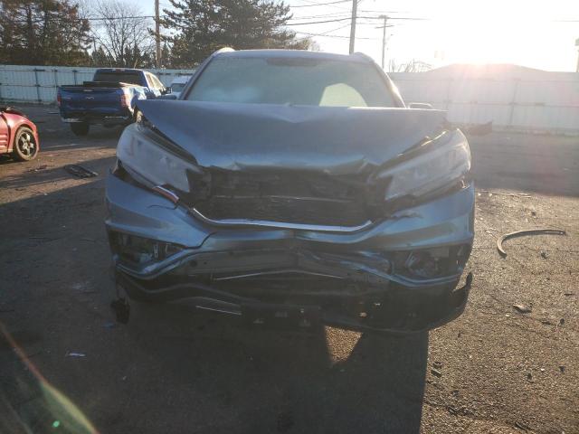 Photo 5 from auction – 2016 HONDA CR-V EXL with VIN 5J6RM4H73GL064024