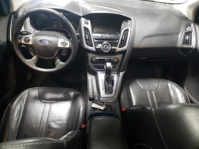 Photo 8 from auction – 2014 FORD FOCUS TITA with VIN 1FADP3J25EL200155