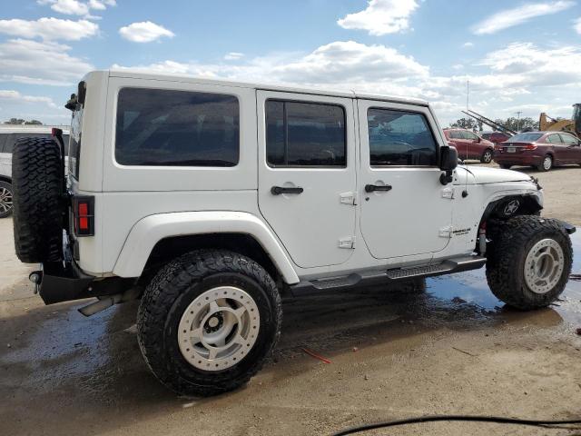 Photo 3 from auction – 2011 JEEP WRANGLER U with VIN 1J4BA3H10BL615809