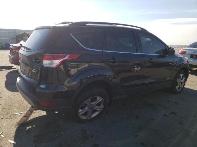 Photo 3 from auction – 2014 FORD ESCAPE SE with VIN 1FMCU9GX4EUB19545