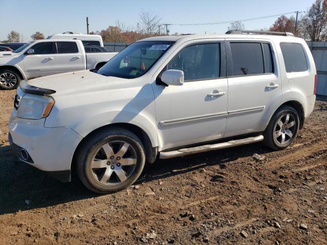 HONDA PILOT TOUR 2012 with VIN 5FNYF4H95CB065587 - Photo from auction