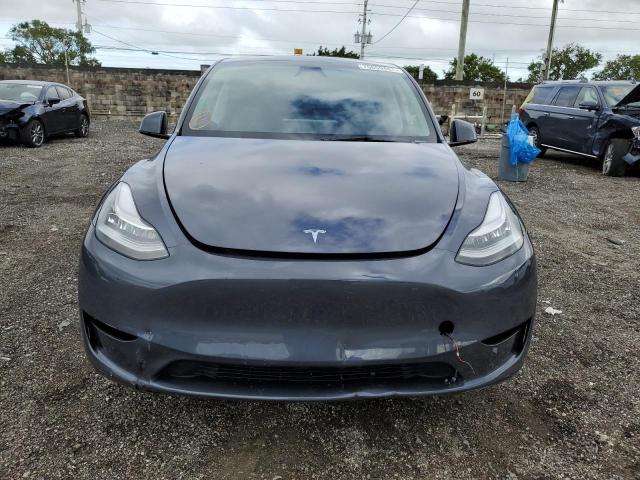Photo 5 from auction – 2023 TESLA MODEL Y with VIN 7SAYGDEE7PA142707