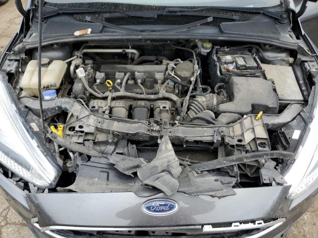 Photo 11 from auction – 2015 FORD FOCUS SE with VIN 1FADP3F20FL374032