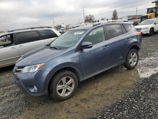 TOYOTA RAV4 XLE 2014 with VIN 2T3RFREV9EW174148 - Photo from auction