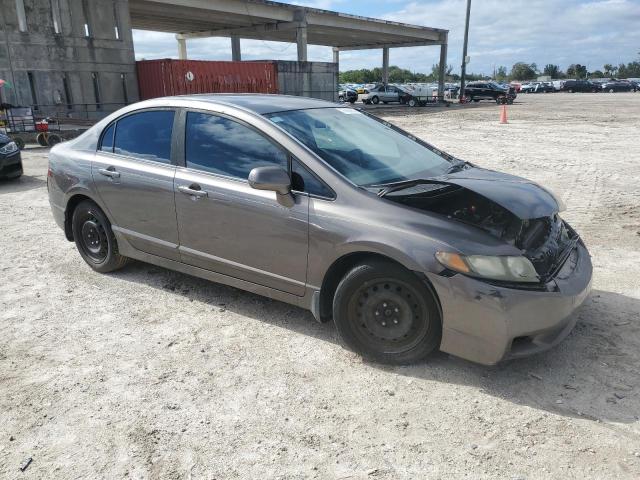 Photo 4 from auction – 2011 HONDA CIVIC LX with VIN 19XFA1F5XBE042203
