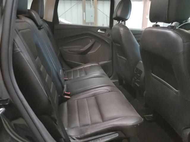 Photo 11 from auction – 2017 FORD ESCAPE TIT with VIN 1FMCU9J9XHUD87241