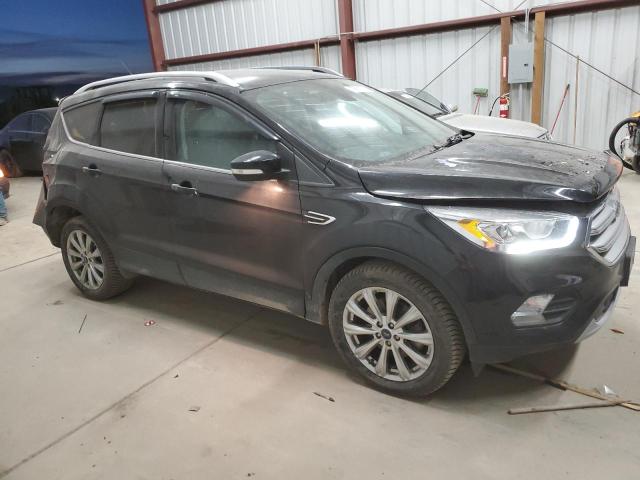 Photo 4 from auction – 2017 FORD ESCAPE TIT with VIN 1FMCU9J9XHUD87241