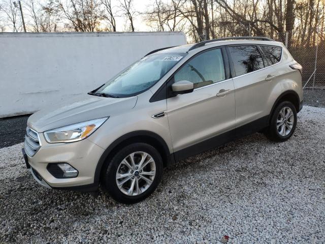 FORD ESCAPE SE 2018 with VIN 1FMCU9GD4JUB42761 - Photo from auction