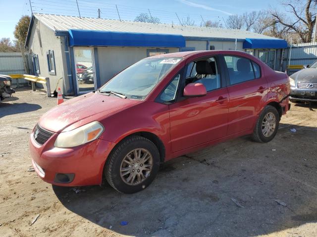 SUZUKI SX4 LE 2012 مع رقم تعريف المركبة JS2YC5A3XC6303570 - صورة من المزاد
