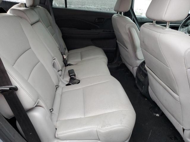 Photo 10 from auction – 2022 HONDA PASSPORT E with VIN 5FNYF8H50NB018734