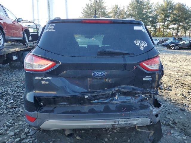 Zdjęcie 6 z aukcji – 2014 FORD ESCAPE SE z VIN 1FMCU9GX4EUB10974