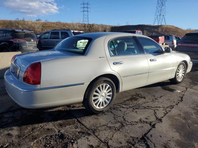 Photo 3 from auction – 2004 LINCOLN TOWN CAR E with VIN 1LNHM81W44Y674941