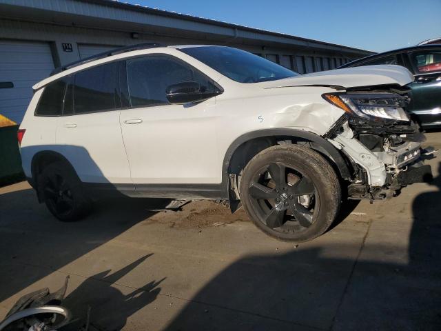 Photo 4 from auction – 2021 HONDA PASSPORT E with VIN 5FNYF8H08MB007211