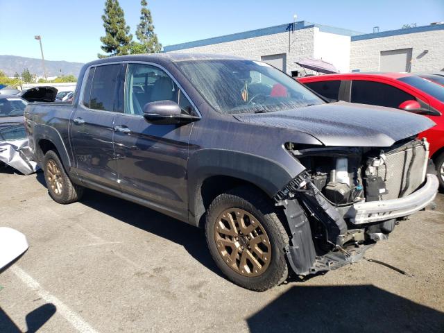 Photo 4 from auction – 2021 HONDA RIDGELINE with VIN 5FPYK3F77MB011708