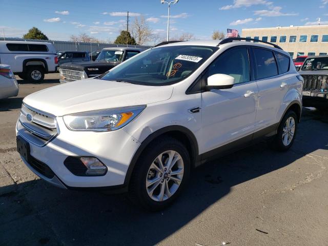 FORD ESCAPE SE 2018 with VIN 1FMCU9GD4JUB13051 - Photo from auction