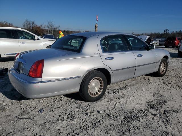 Photo 3 from auction – 2002 LINCOLN TOWN CAR E with VIN 1LNHM81W42Y667176