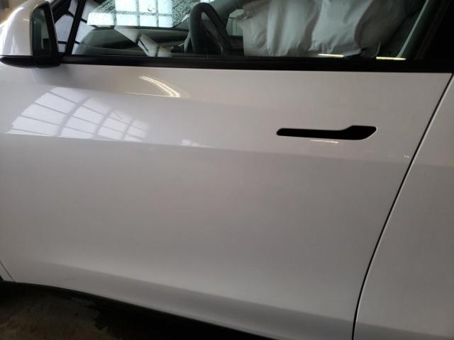 Photo 7 from auction – 2023 TESLA MODEL Y with VIN 7SAYGDEE9PA114858