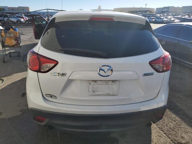 Photo 6 from auction – 2015 MAZDA CX-5 SPORT with VIN JM3KE2BE9F0475841