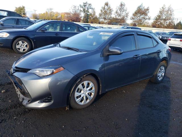 TOYOTA COROLLA L 2017 with VIN 2T1BURHE1HC891094 - Photo from auction