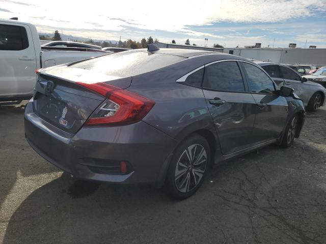 Photo 3 from auction – 2017 HONDA CIVIC EXL with VIN 2HGFC1F71HH652761