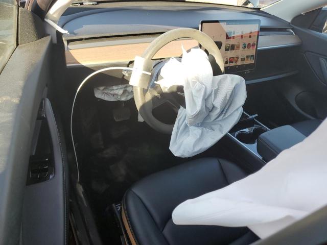 Photo 8 from auction – 2021 TESLA MODEL Y with VIN 5YJYGDEE2MF080743