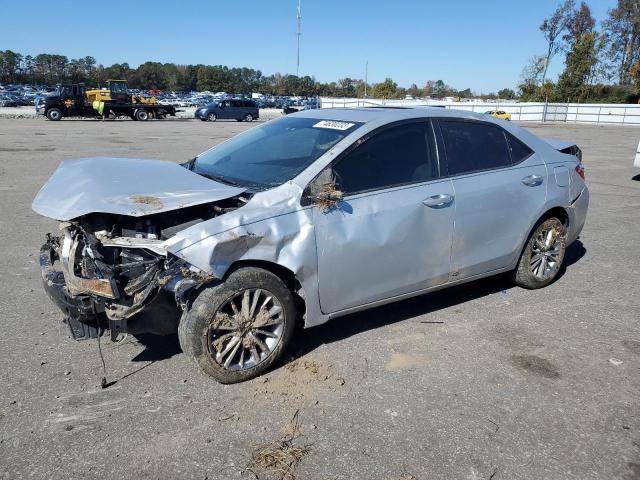 TOYOTA COROLLA L 2015 with VIN 2T1BURHE6FC282211 - Photo from auction