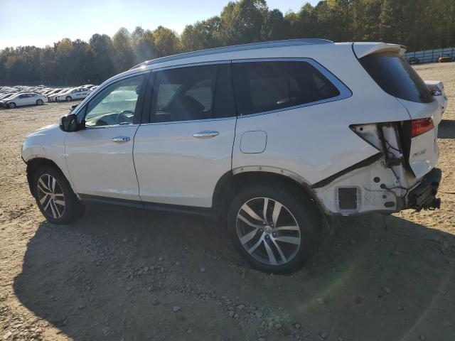Photo 2 from auction – 2016 HONDA PILOT TOUR with VIN 5FNYF5H94GB036562