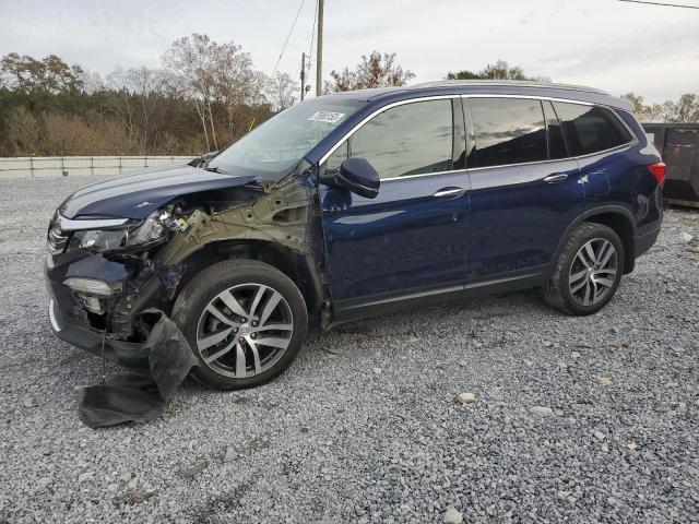 HONDA PILOT TOUR 2017 with VIN 5FNYF6H93HB039024 - Photo from auction