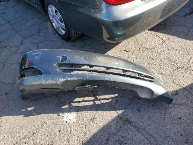 Photo 12 from auction – 2003 TOYOTA CAMRY LE with VIN JTDBE32K830239116