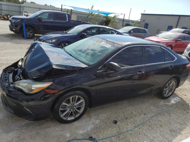 TOYOTA CAMRY LE 2016 with VIN 4T1BF1FK0GU215527 - Photo from auction