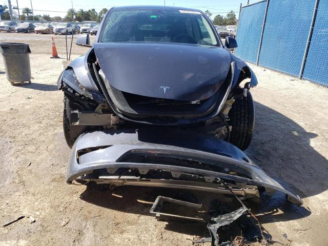 Photo 5 from auction – 2023 TESLA MODEL Y with VIN 7SAYGDEE9PA044939
