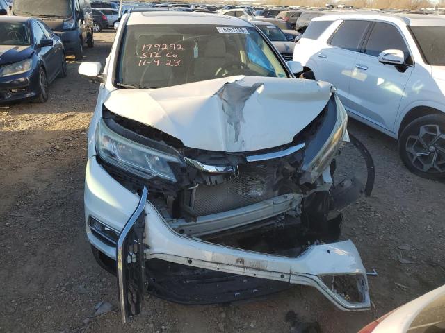 Photo 5 from auction – 2015 HONDA CR-V EX with VIN 5J6RM4H5XFL035097