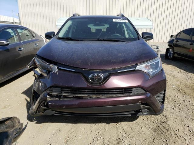 Photo 5 from auction – 2018 TOYOTA RAV4 LE with VIN 2T3ZFREV4JW472410
