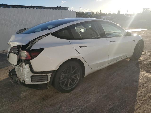 Photo 3 from auction – 2021 TESLA MODEL 3 with VIN 5YJ3E1EA2MF090409