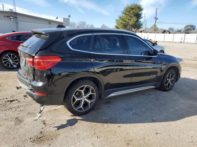Photo 3 from auction – 2016 BMW X1 XDRIVE2 with VIN WBXHT3C35G5E50005