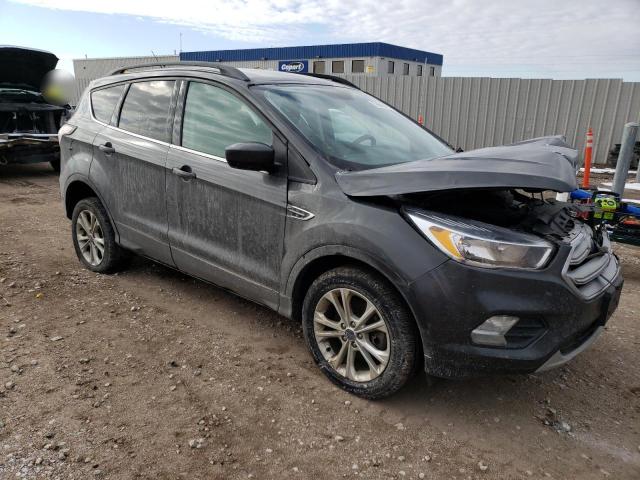 Photo 4 from auction – 2018 FORD ESCAPE SE with VIN 1FMCU9GD4JUD07823