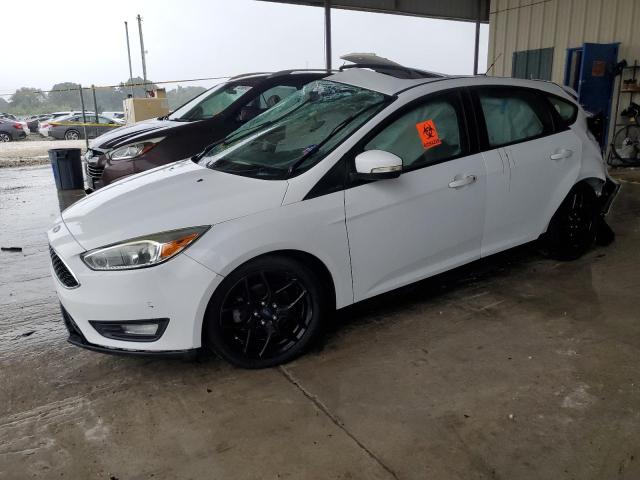 FORD FOCUS SE 2016 with VIN 1FADP3K29GL299693 - Photo from auction