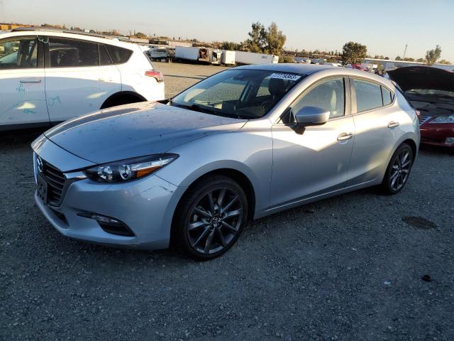 MAZDA 3 TOURING 2018 with VIN 3MZBN1L30JM180033 - Photo from auction