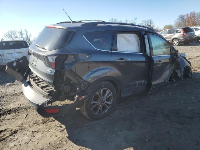 Photo 3 from auction – 2017 FORD ESCAPE SE with VIN 1FMCU9G90HUD49475