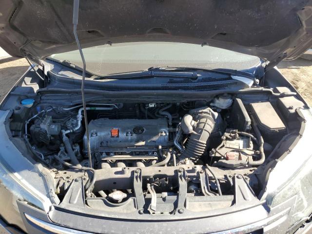 Photo 11 from auction – 2014 HONDA CR-V LX with VIN 2HKRM4H39EH682002